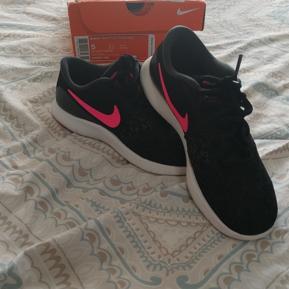 Black and pink Nikes